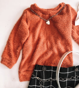 Orange fuzzy keyhole sweater