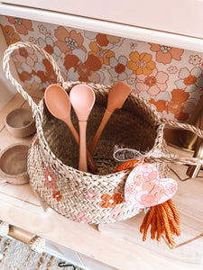 Woven hand painted floral basket